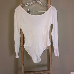 Casual ribbed white semi off-the-shoulder bodysuit